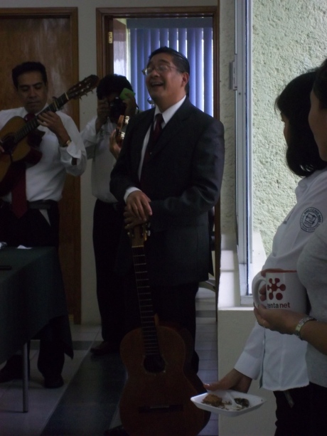The Rondalla: Singing ballads mixes nicely with business.